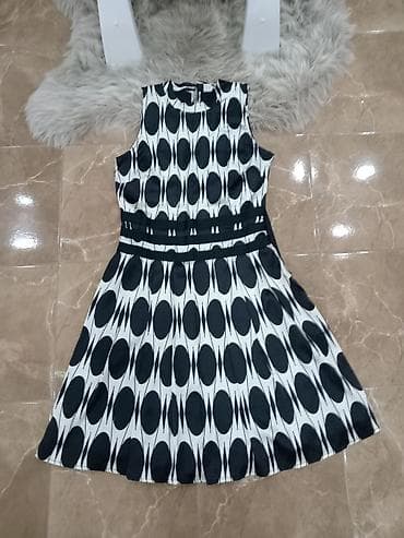 kom sa etiketom: Ženska haljina bez rukava, A‑kroja, sa okruglim izrezom. Crno‑bez at lalafo.rs — 1 kom sa etiketom: Ženska haljina bez rukava, A‑kroja, sa okruglim izrezom. Crno‑bez — 1