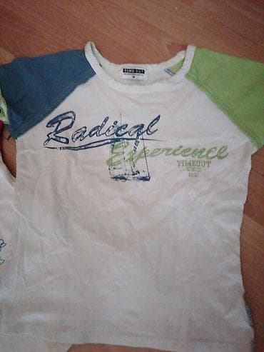 Tri ženske majice kratkih rukava različitih dezena. Jedna majica je na lalafo.rs — 2 Tri ženske majice kratkih rukava različitih dezena. Jedna majica je — 2