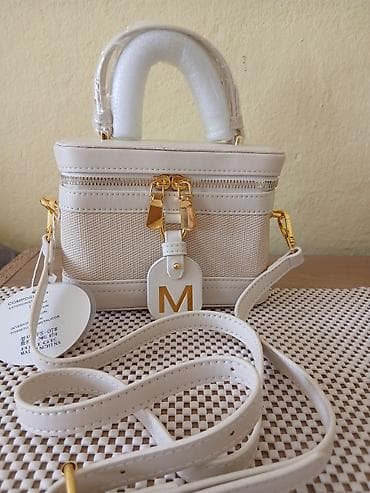 Miu Miu elegantna ženska torbica u bež/ekru nijansi sa zlatnim na lalafo.rs Miu Miu elegantna ženska torbica u bež/ekru nijansi sa zlatnim