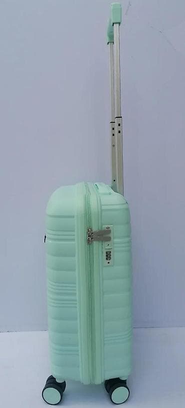 torba fashion bags: Tvrdi kofer na točkiće – mint zelena boja - Kompaktna veličina at lalafo.rs — 9 torba fashion bags: Tvrdi kofer na točkiće – mint zelena boja - Kompaktna veličina — 9