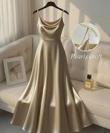 Saten haljina na bretele sa biserima - Model: duga, lepršava A-kroja na lalafo.rs Saten haljina na bretele sa biserima - Model: duga, lepršava A-kroja