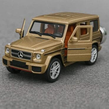 Figurice i makete: Mercedes g-class g-4x4 zlatni metalni model 1:24. mercedes g-class na lalafo.rs Figurice i makete: Mercedes g-class g-4x4 zlatni metalni model 1:24. mercedes g-class