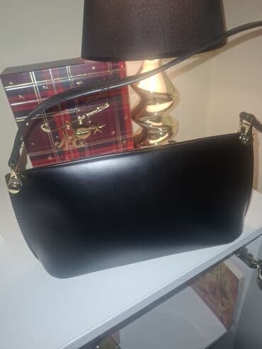 Crna ženska torba preko ramena – elegantan minimalistički dizajn - na lalafo.rs Crna ženska torba preko ramena – elegantan minimalistički dizajn -