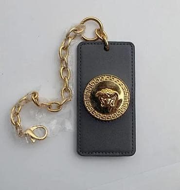 Versace Bag Tag Poshmark ORIGINAL. Original VERSACE oznaka za torbu na lalafo.rs Versace Bag Tag Poshmark ORIGINAL. Original VERSACE oznaka za torbu