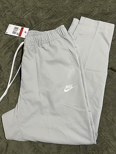 pantalone gina benotti: NIKE Club Woven Tapered Leg Pants Standard Fit Grey vel.M,L at lalafo.rs — 7 pantalone gina benotti: NIKE Club Woven Tapered Leg Pants Standard Fit Grey vel.M,L — 7