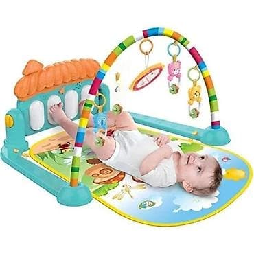Muzička bebi gimnastika – podloga sa lukom i igračkama - Šarena na lalafo.rs Muzička bebi gimnastika – podloga sa lukom i igračkama - Šarena