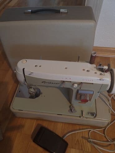 Gritzner električna šivaća mašina sa koferom i papučicom - Model sa na lalafo.rs Gritzner električna šivaća mašina sa koferom i papučicom - Model sa