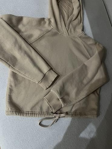 Bež dukser sa kapuljačom - Model: klasična hoodie majica sa raglan na lalafo.rs Bež dukser sa kapuljačom - Model: klasična hoodie majica sa raglan