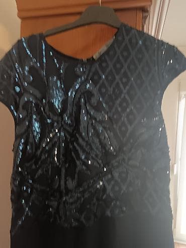 Obucena jedbom Elegantna crna koktel/večernja haljina sa šljokicama - na lalafo.rs Obucena jedbom Elegantna crna koktel/večernja haljina sa šljokicama -