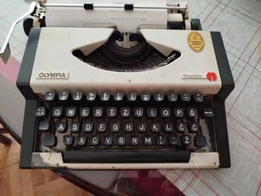 Antique devices: Olympia mehanička pisaća mašina sa koferom Nepoznato stanje. Mora at lalafo.rs — 7 Antique devices: Olympia mehanička pisaća mašina sa koferom Nepoznato stanje. Mora — 7
