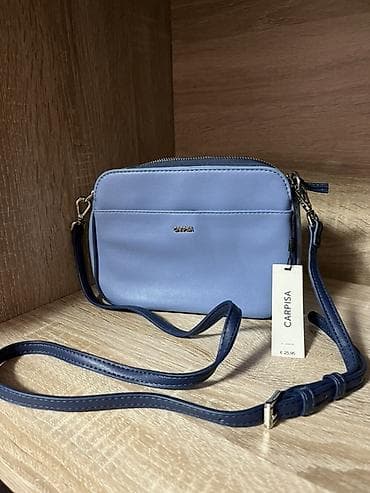 Carpisa torbica preko ramena – pastelno plava - Kompaktna crossbody at lalafo.rs — 1 Carpisa torbica preko ramena – pastelno plava - Kompaktna crossbody — 1