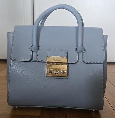 FURLA Metropolis kožna torba. Nosi se u ruci. Azzuro boja, svetlo na lalafo.rs FURLA Metropolis kožna torba. Nosi se u ruci. Azzuro boja, svetlo