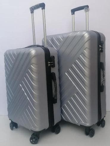 dve suknje po: Tvrdi kofer za putovanje – srebrni - Materijal: izdržljiva at lalafo.rs — 4 dve suknje po: Tvrdi kofer za putovanje – srebrni - Materijal: izdržljiva — 4