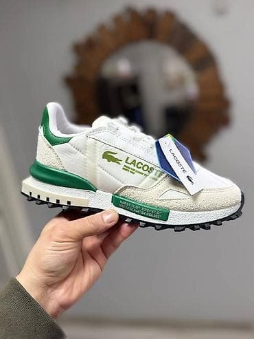 Lacoste uniseks patike – retro trkački stil - Model na lalafo.rs Lacoste uniseks patike – retro trkački stil - Model