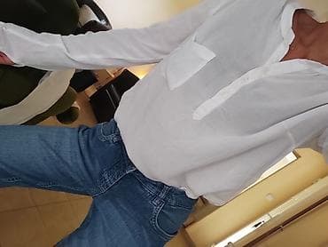 Bela ženska košulja od tankog, materijala, idealna za toplije dane ili na lalafo.rs — 3 Bela ženska košulja od tankog, materijala, idealna za toplije dane ili — 3