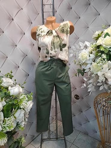 Elegantna ženska kombinacija – bluzica bez rukava i pantalone visokog na lalafo.rs Elegantna ženska kombinacija – bluzica bez rukava i pantalone visokog