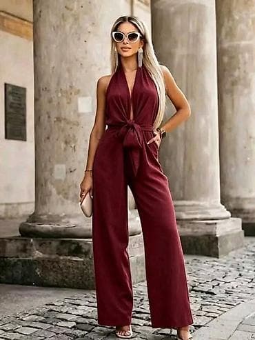 Jumpsuits: Elegantni ženski kombinezon bez rukava, sa dubokim preklopnim at lalafo.rs — 2 Jumpsuits: Elegantni ženski kombinezon bez rukava, sa dubokim preklopnim — 2