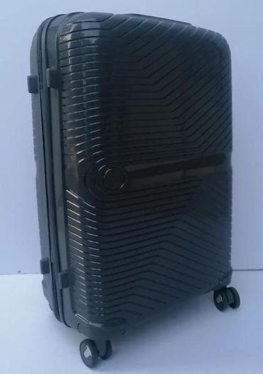 Travel suitcases and bags: Tvrdi kofer na točkiće, tamnosive boje, sa modernom žljebastom at lalafo.rs — 7 Travel suitcases and bags: Tvrdi kofer na točkiće, tamnosive boje, sa modernom žljebastom — 7