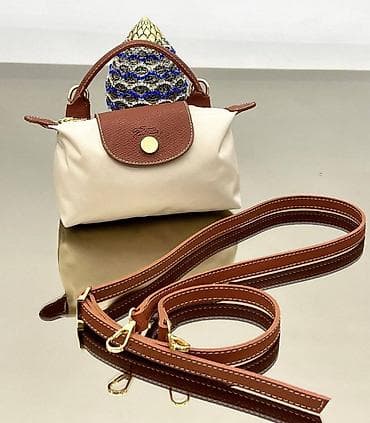 Watches: Longchamp Le Pliage nano torbica sa remenom (mini crossbody) at lalafo.rs — 6 Watches: Longchamp Le Pliage nano torbica sa remenom (mini crossbody) — 6