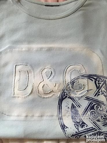 Svetlo plava bodi majca D&G, očuvana.Svetlo plava majca D&G na lalafo.rs — 6 Svetlo plava bodi majca D&G, očuvana.Svetlo plava majca D&G — 6