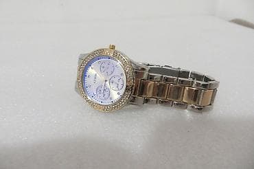 GUESS zenski kvalitetan, moderan sat, sa kvalitetnom narukvicom boja na lalafo.rs GUESS zenski kvalitetan, moderan sat, sa kvalitetnom narukvicom boja