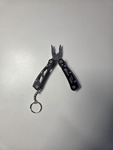 Multifunkcionalni alat - privezak na lalafo.rs — 2 Multifunkcionalni alat - privezak — 2