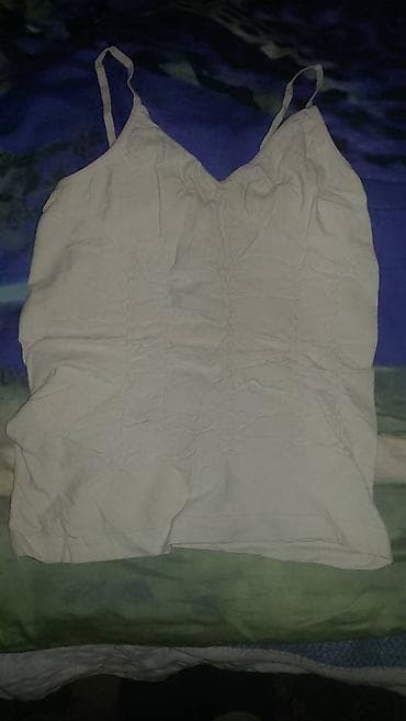 Na prodaju svetlo roza majica na bretele, ima elastina, M veličina at lalafo.rs Na prodaju svetlo roza majica na bretele, ima elastina, M veličina