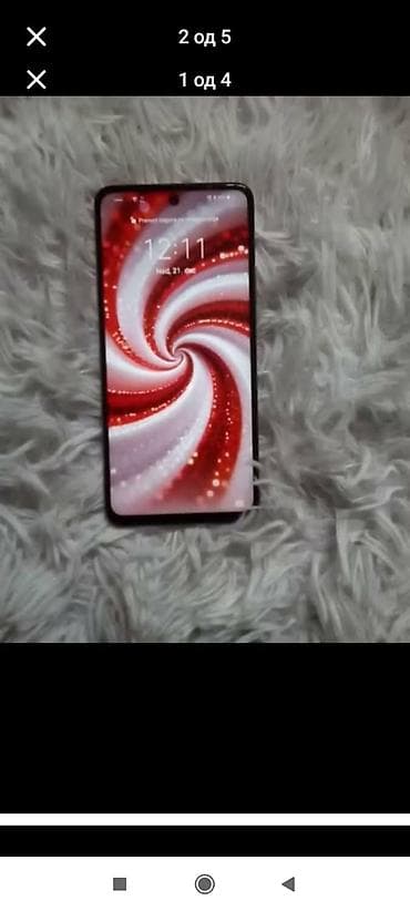 Pametni telefon sa velikim ekranom pune površine i rupicom za prednju na lalafo.rs Pametni telefon sa velikim ekranom pune površine i rupicom za prednju