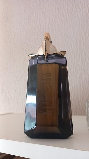 Thierry Mugler Alien edp 90ml Nedostaje 7-8ml Savršen parfem na lalafo.rs Thierry Mugler Alien edp 90ml Nedostaje 7-8ml Savršen parfem