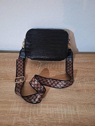 Nova Mohito crna torbica dva kaiša, širok kaiš preko ramena Nova at lalafo.rs — 5 Nova Mohito crna torbica dva kaiša, širok kaiš preko ramena Nova — 5