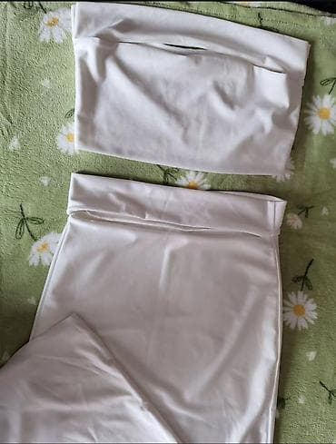 Beli komplet suknje i topa - Dva dela: uska midi/duga suknja visokog na lalafo.rs — 1 Beli komplet suknje i topa - Dva dela: uska midi/duga suknja visokog — 1