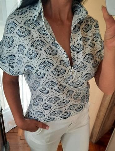 Women's Clothing: Lanena kosulja bluza ravnog kroja bele boje sa plavim dezenom. Nazad at lalafo.rs — 1 Women's Clothing: Lanena kosulja bluza ravnog kroja bele boje sa plavim dezenom. Nazad — 1