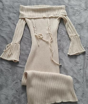 Pleteni ženski džemper-haljina, krem boje. - Kroj: uska silueta koja na lalafo.rs Pleteni ženski džemper-haljina, krem boje. - Kroj: uska silueta koja