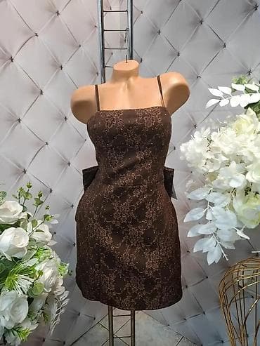 Elegantna mini haljina sa mašnom na leđima - Kroj: pripijena mini na lalafo.rs — 1 Elegantna mini haljina sa mašnom na leđima - Kroj: pripijena mini — 1