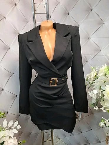 Elegantna crna mini haljina sako kroja. - Duboki V izrez i široke na lalafo.rs Elegantna crna mini haljina sako kroja. - Duboki V izrez i široke