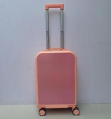 Travel suitcases and bags: Kofer na točkićima – ružičasta/losos nijansa, kabinski format - Tvrda at lalafo.rs — 1 Travel suitcases and bags: Kofer na točkićima – ružičasta/losos nijansa, kabinski format - Tvrda — 1