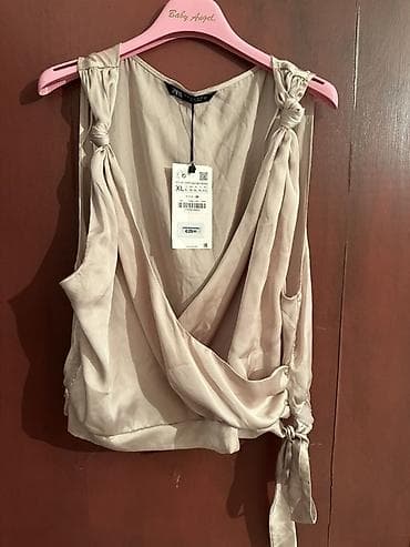 Zara ženska bluza bez rukava u bež/šljamp nijansi. Sa etiketom na lalafo.rs Zara ženska bluza bez rukava u bež/šljamp nijansi. Sa etiketom