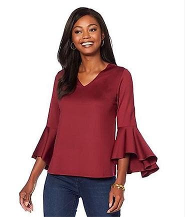 Bluza u ve dekolte sa 3/4 rukavima sa zvono volanima.Sa na lalafo.rs Bluza u ve dekolte sa 3/4 rukavima sa zvono volanima.Sa