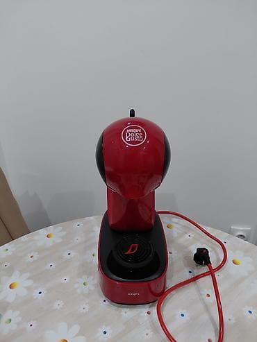 Dolce Gusto aparat prelepe crvene boje u odlicnom stanju . Uredjaj na lalafo.rs Dolce Gusto aparat prelepe crvene boje u odlicnom stanju . Uredjaj