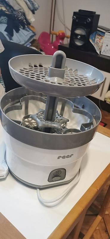 Reer sterilizator za 6 flašica, očuvan, kao nov - komotan i za na lalafo.rs Reer sterilizator za 6 flašica, očuvan, kao nov - komotan i za