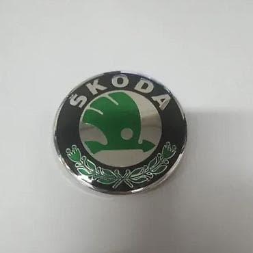 === PART 1: TEXTUAL DESCRIPTION === Okrugli amblem za automobil marke na lalafo.rs === PART 1: TEXTUAL DESCRIPTION === Okrugli amblem za automobil marke