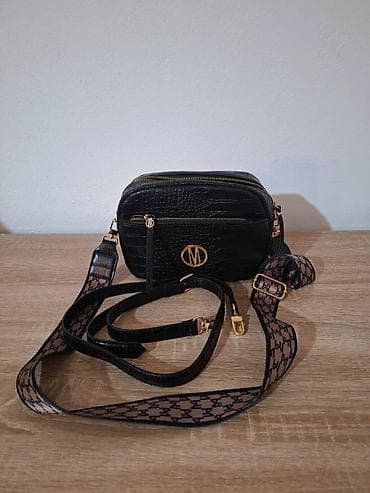 Nova Mohito crna torbica dva kaiša, širok kaiš preko ramena Nova at lalafo.rs — 6 Nova Mohito crna torbica dva kaiša, širok kaiš preko ramena Nova — 6