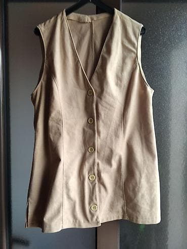 Prsluk, veličina L, u super stanju. - Model: duži, bez rukava na lalafo.rs Prsluk, veličina L, u super stanju. - Model: duži, bez rukava