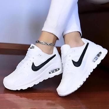 zenske original guess: Nike ženske patike – bele, sa vidljivom Air jedinicom u đonu. Model sa na lalafo.rs — 3 zenske original guess: Nike ženske patike – bele, sa vidljivom Air jedinicom u đonu. Model sa — 3
