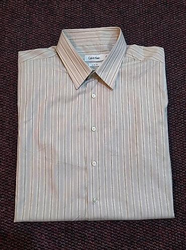 Muška pamučna košulja Calvin Klein vel. XXL Prvoklasna, moćna na lalafo.rs — 8 Muška pamučna košulja Calvin Klein vel. XXL Prvoklasna, moćna — 8