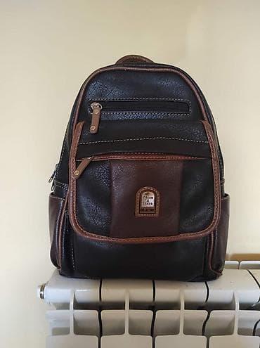 Ranac. Iz uvoza. Dimenzije 31x25x10. Sa dosta pregrada. Polovan na lalafo.rs Ranac. Iz uvoza. Dimenzije 31x25x10. Sa dosta pregrada. Polovan