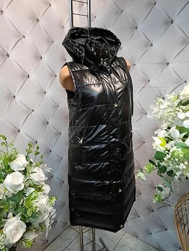 Duga ženska prsluk-jakna sa kapuljačom - Model: prošiven, produžena na lalafo.rs Duga ženska prsluk-jakna sa kapuljačom - Model: prošiven, produžena