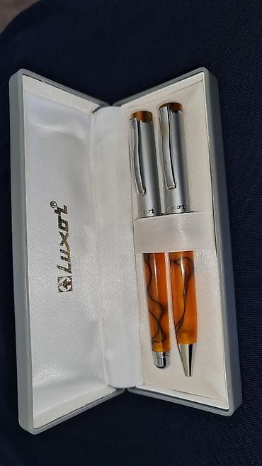 Luxor poklon set pisaćih instrumenata dal su od sedefa ili cilibara na lalafo.rs — 1 Luxor poklon set pisaćih instrumenata dal su od sedefa ili cilibara — 1