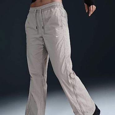 Nike Sportswear Collection Women's Mid-Rise Repel Zip Trousers vel.XS na lalafo.rs — 5 Nike Sportswear Collection Women's Mid-Rise Repel Zip Trousers vel.XS — 5