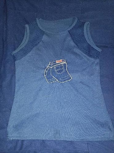 Na prodaju plava majica bez rukava sa mrežicom, za uzrast 11-12 na lalafo.rs — 2 Na prodaju plava majica bez rukava sa mrežicom, za uzrast 11-12 — 2
